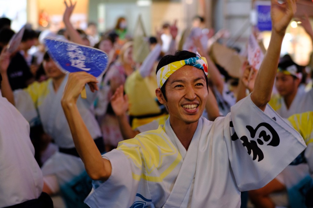 The smile of a dancer during the exhibition 